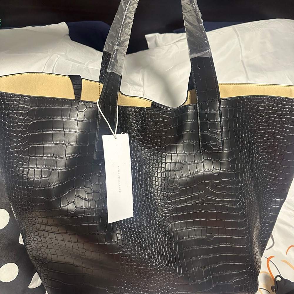 Black Textured Tote Bag with Crocodile Pattern and Sturdy Handles